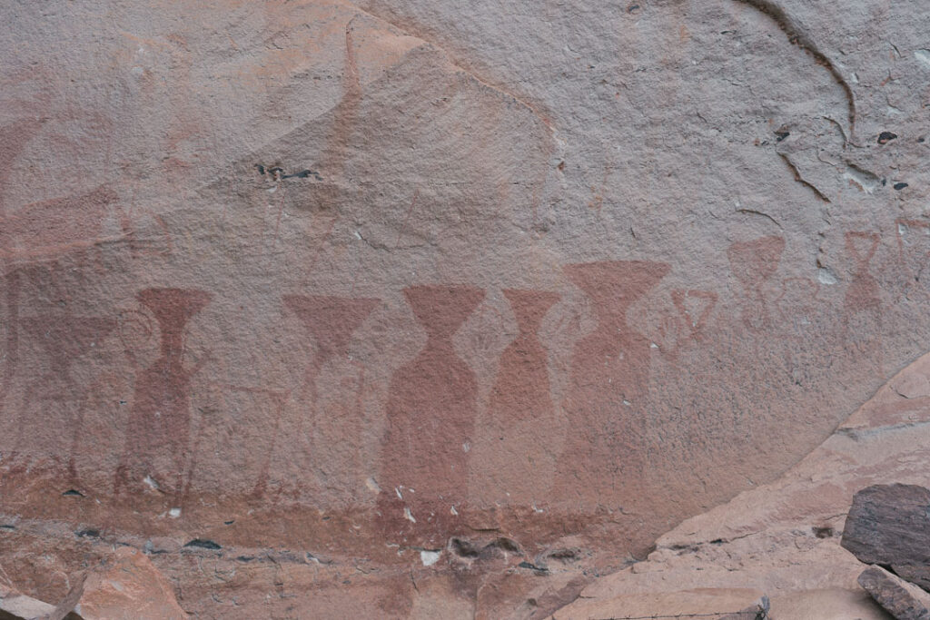 Rock painting resembling alien figure at Pha Taem