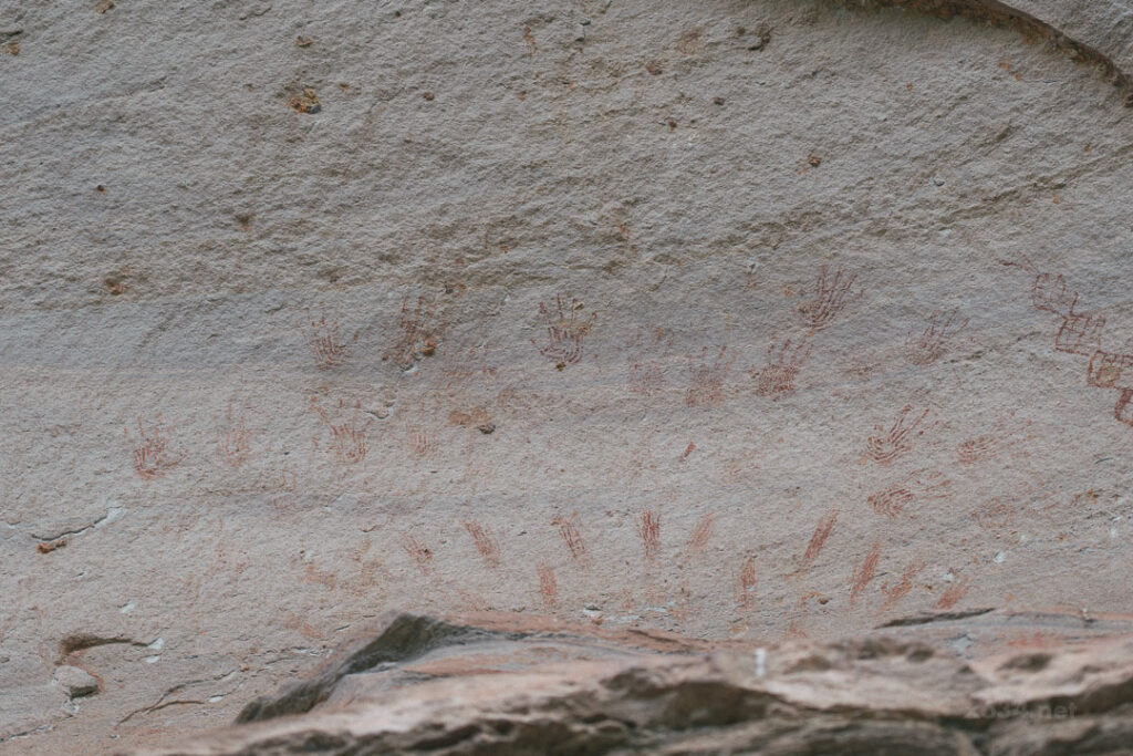 3000-year-old handprints on cliff wall at Pha Taem
